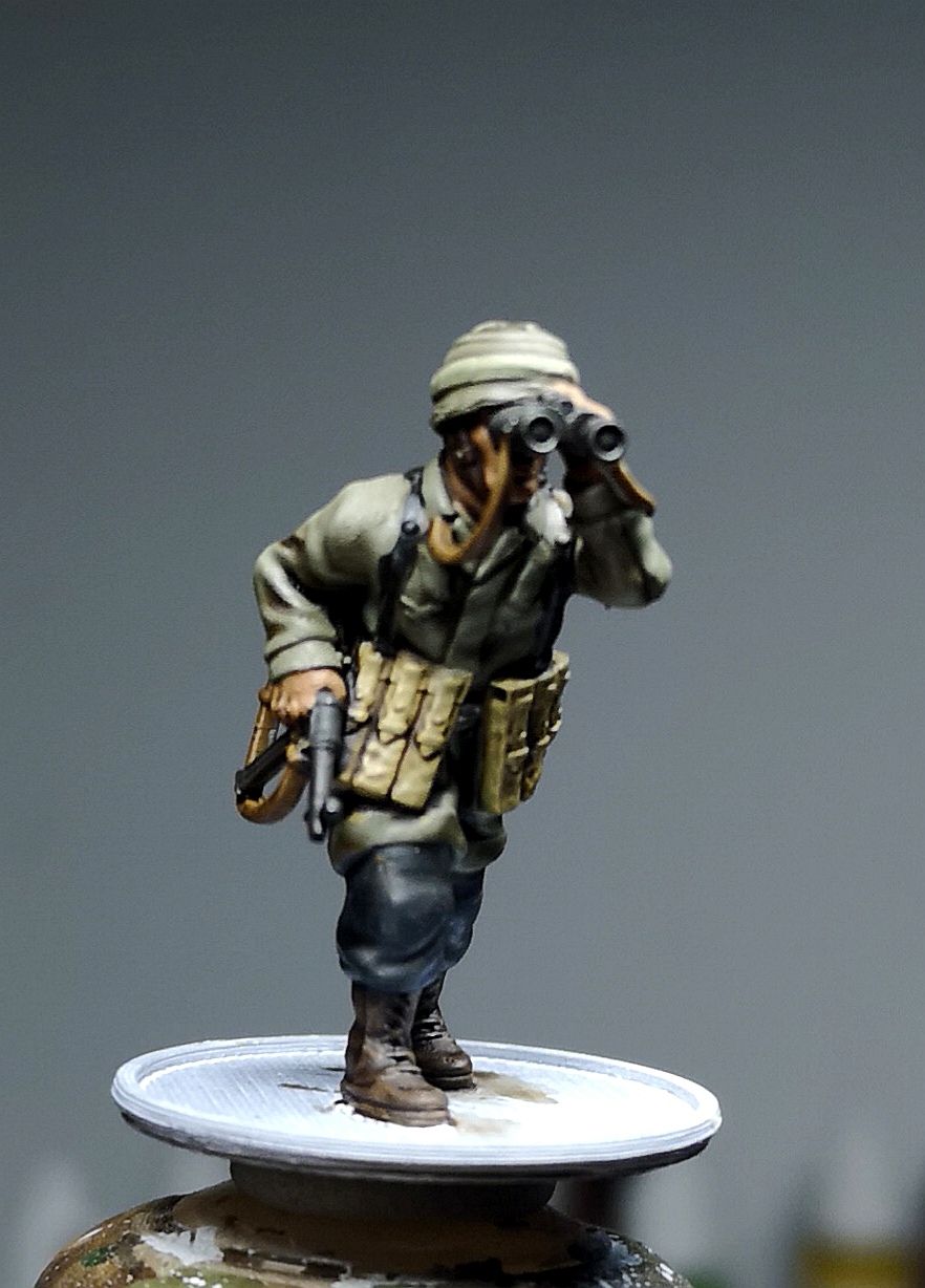 Col.Muller German Paratrooper NCO observing with binoculars.