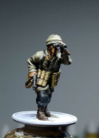 Col.Muller German Paratrooper NCO observing with binoculars.