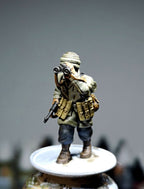 Col.Muller German Paratrooper NCO observing with binoculars.