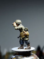 Col.Muller German Paratrooper NCO observing with binoculars.