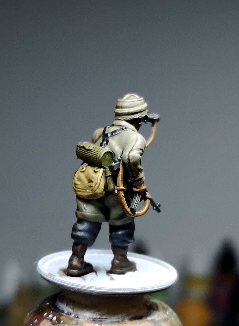 Col.Muller German Paratrooper NCO observing with binoculars.